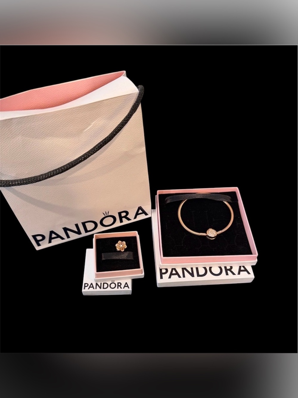 #522. Pandora Rose Gold Bangle Bracelet with Sparkling Pink Snowflake Charm